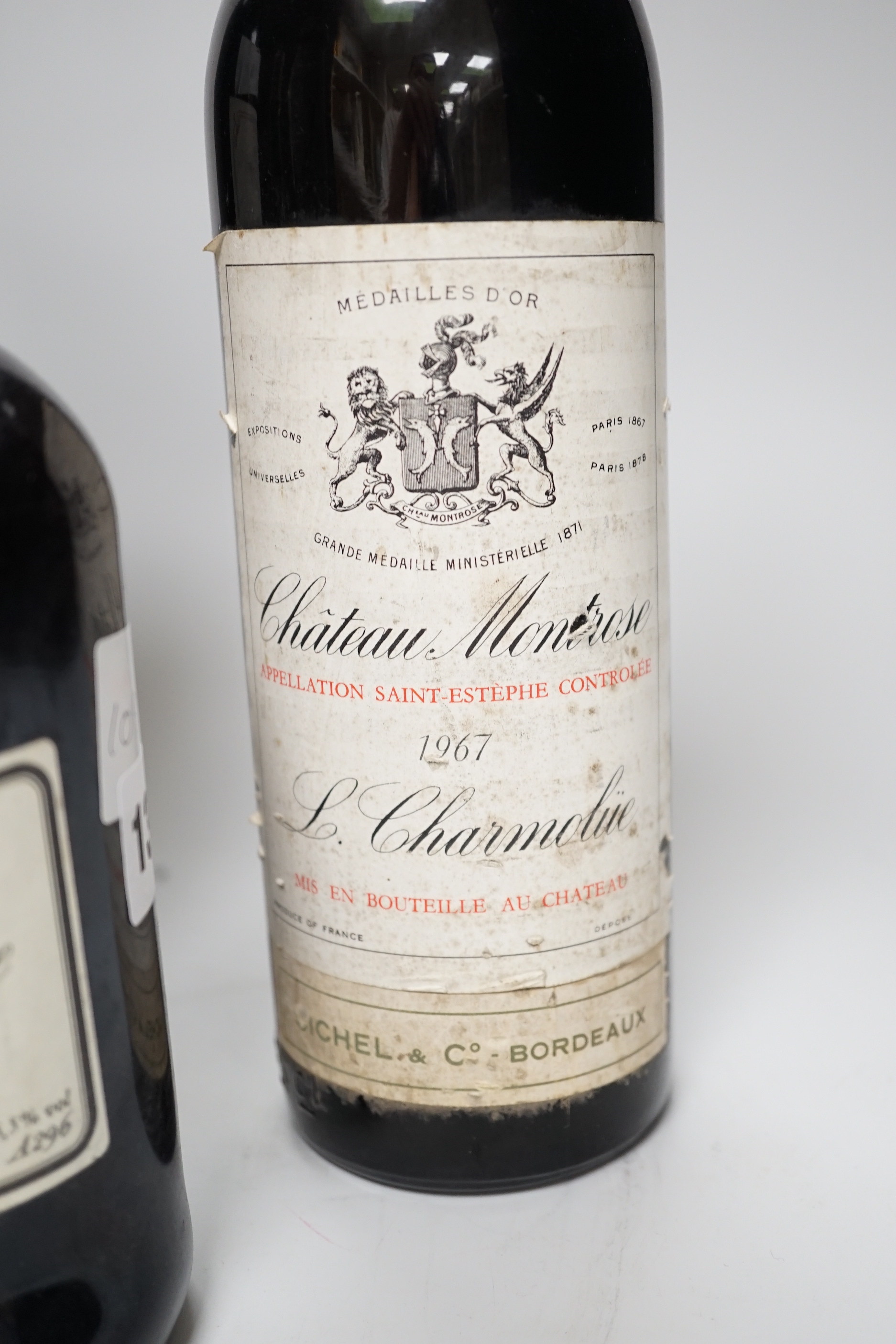 A magnum of Chateau Latour, 1983 and three other bottles of wine including Chateau Montrose, 1967.